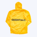 Essentials Graphic Hooded Coach Yellow Jacket
